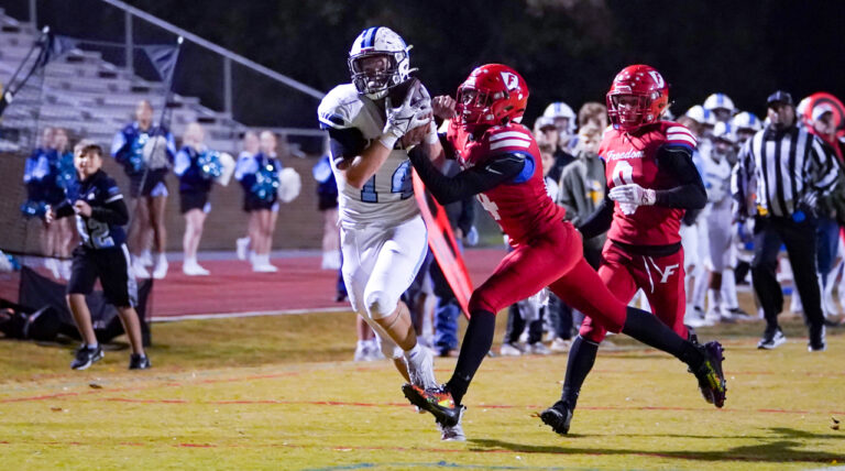 Pioneers clinch sixth consecutive conference championship with thrilling 54-48 win over Freedom