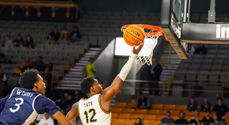 Mountaineers use late rally to soar by Coastal Carolina, 64-46