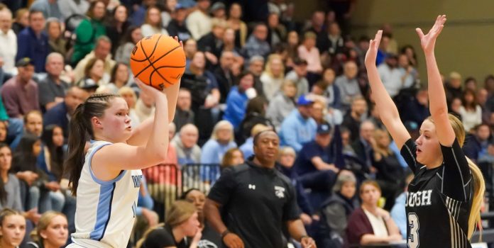 Watauga senior Julie Matheson lets fly a 3-pointer during the Pioneers' Round 2 win over Hough at Lentz Eggers Gym, Feb. 28. Photographic image by David Rogers for High Country Sports